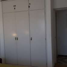 Dormitorio con placard