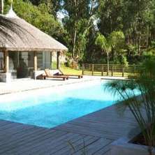 Piscina y Deck Solarium