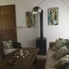 Living con hogar a leña