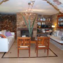 Living con hogar a leña