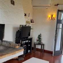 Living con hogar a leña