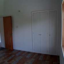 Dormitorio con placard