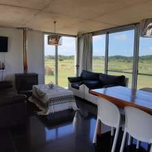 Living comedor con estufa a leña