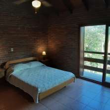 Dormitorio Principal con balcón al jardín