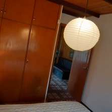 Dormitorio con placard