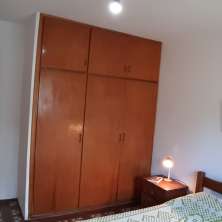 Dormitorio con placard
