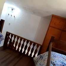 Dormitorio single abierto