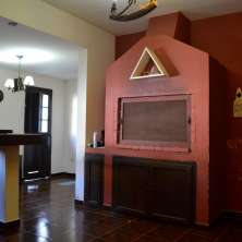 Living con parrillero interior