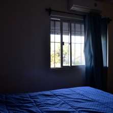  Tercer dormitorio con vista al patio